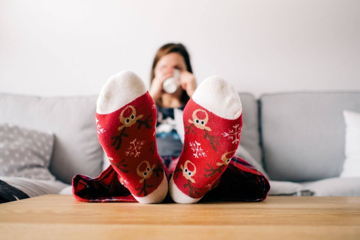 woman wearing scented christmas socks